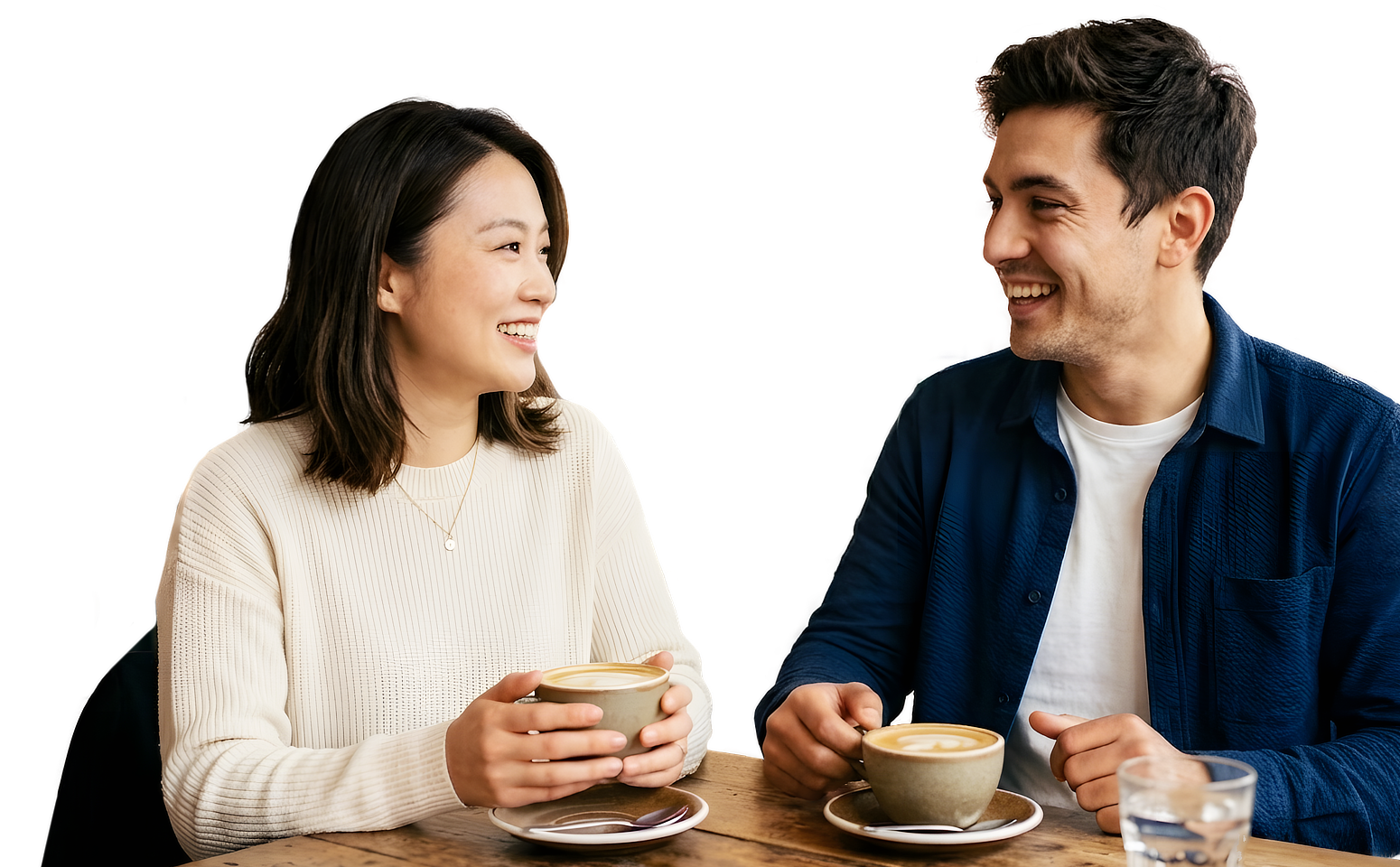 two people chatting while drinking coffee